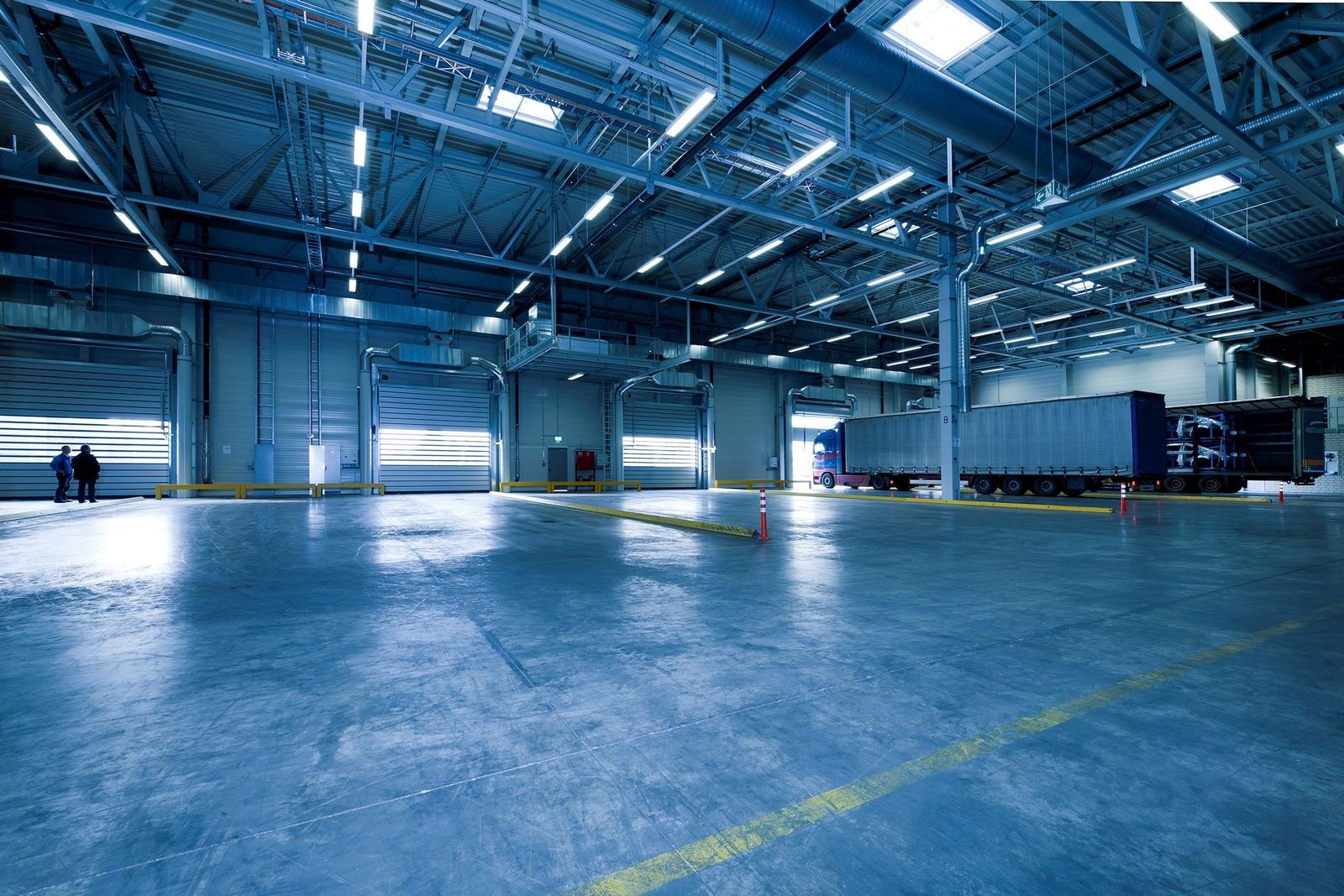 Blue coated industrial floor with aisle markings
