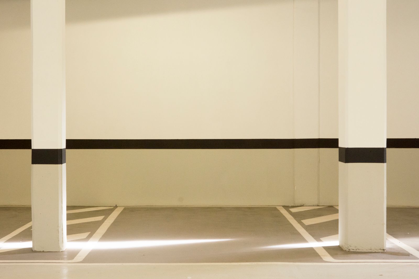 Safety line striping laid into a coated warehouse floor